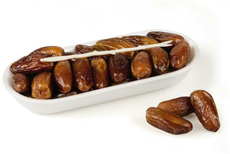 Datteln 'Deglet Nour' mit Stein aus Tunesien