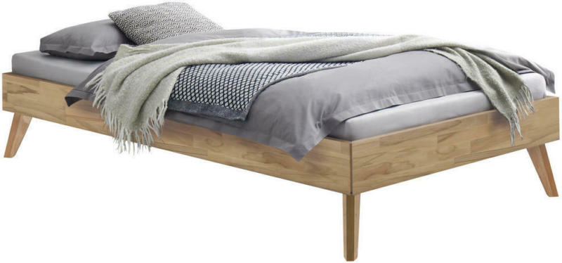 Bett in Buchefarben
