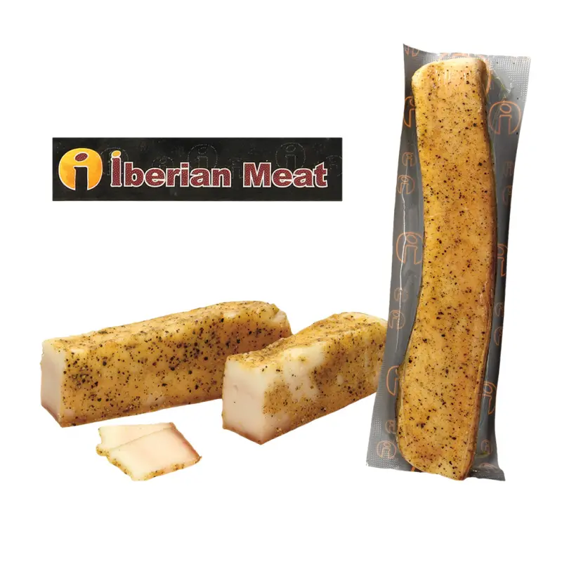 Iberischer Schweinerückenspeck mit Schwarte, gesalzen, mit Knoblauch und schwarzem Pfeffer