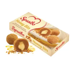 Rührkuchen-Kugeln mit Honig (2,9%), gefüllt mit gezuckerter Kondensmilch, tiefgefroren.