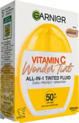 Fluid de zi nuanțator cu SPF50+ medium